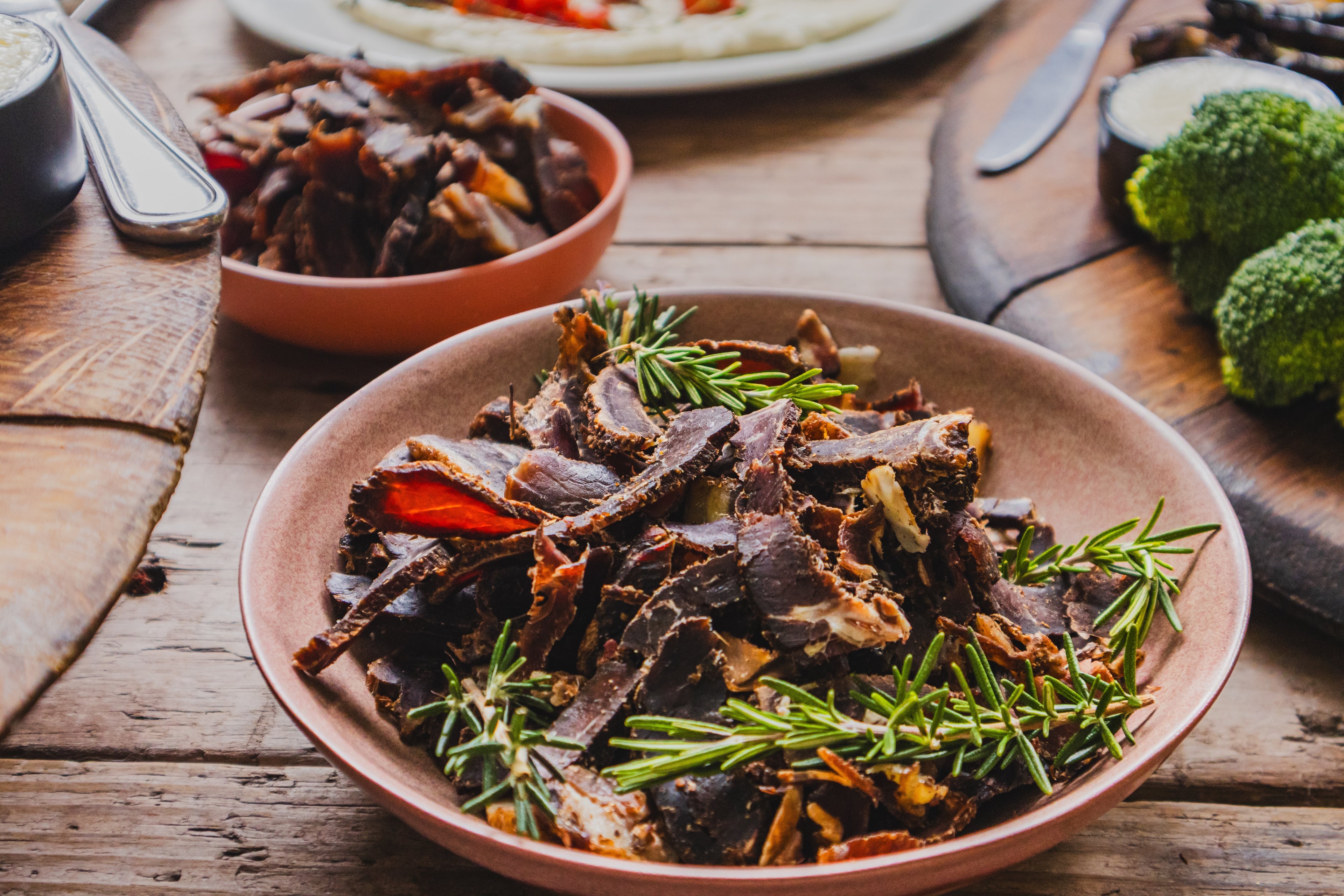 Bowls of Raw Sintra dried beef biltong, made in Portugal and high in protein